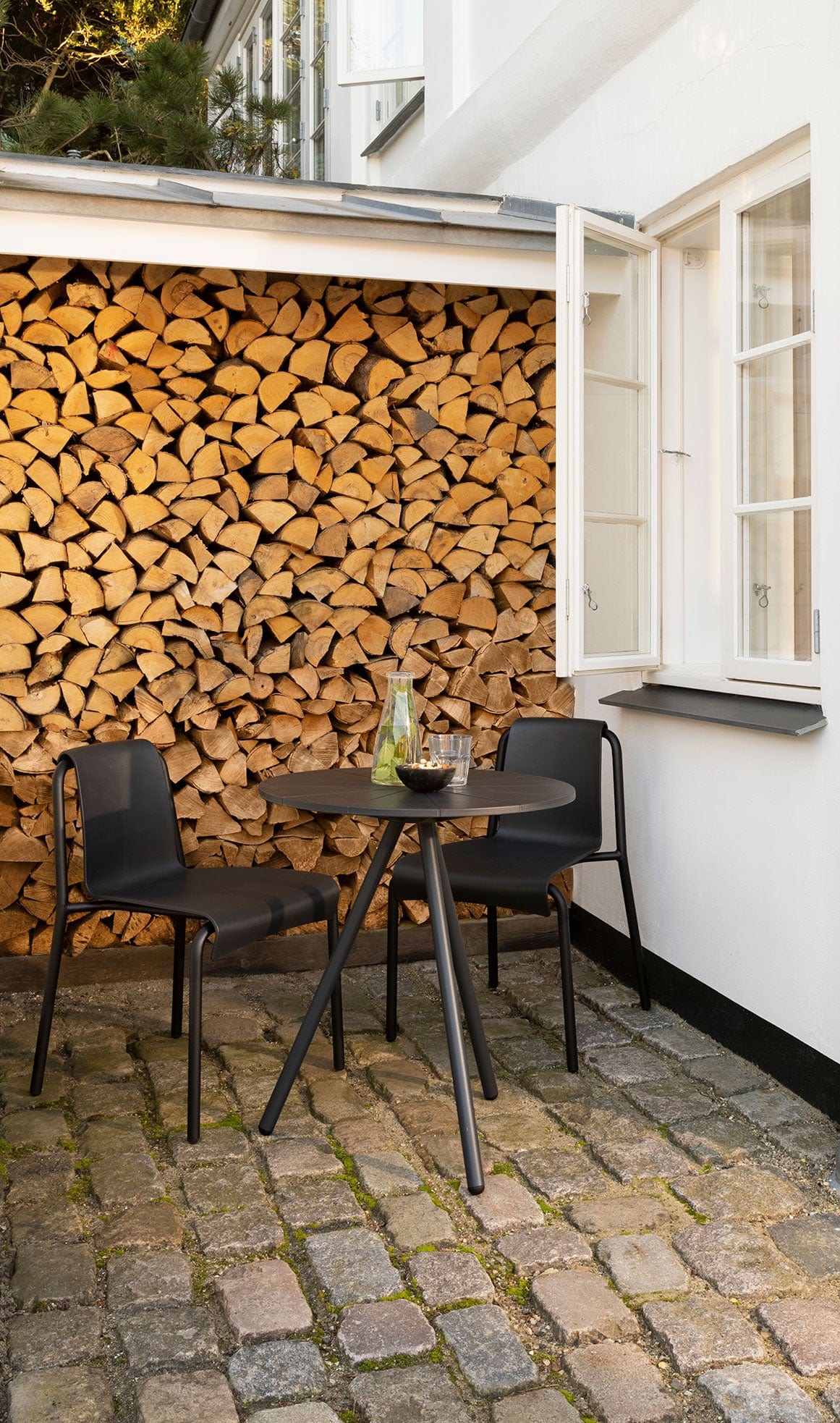 NAMI black dining set with cafe table on patio