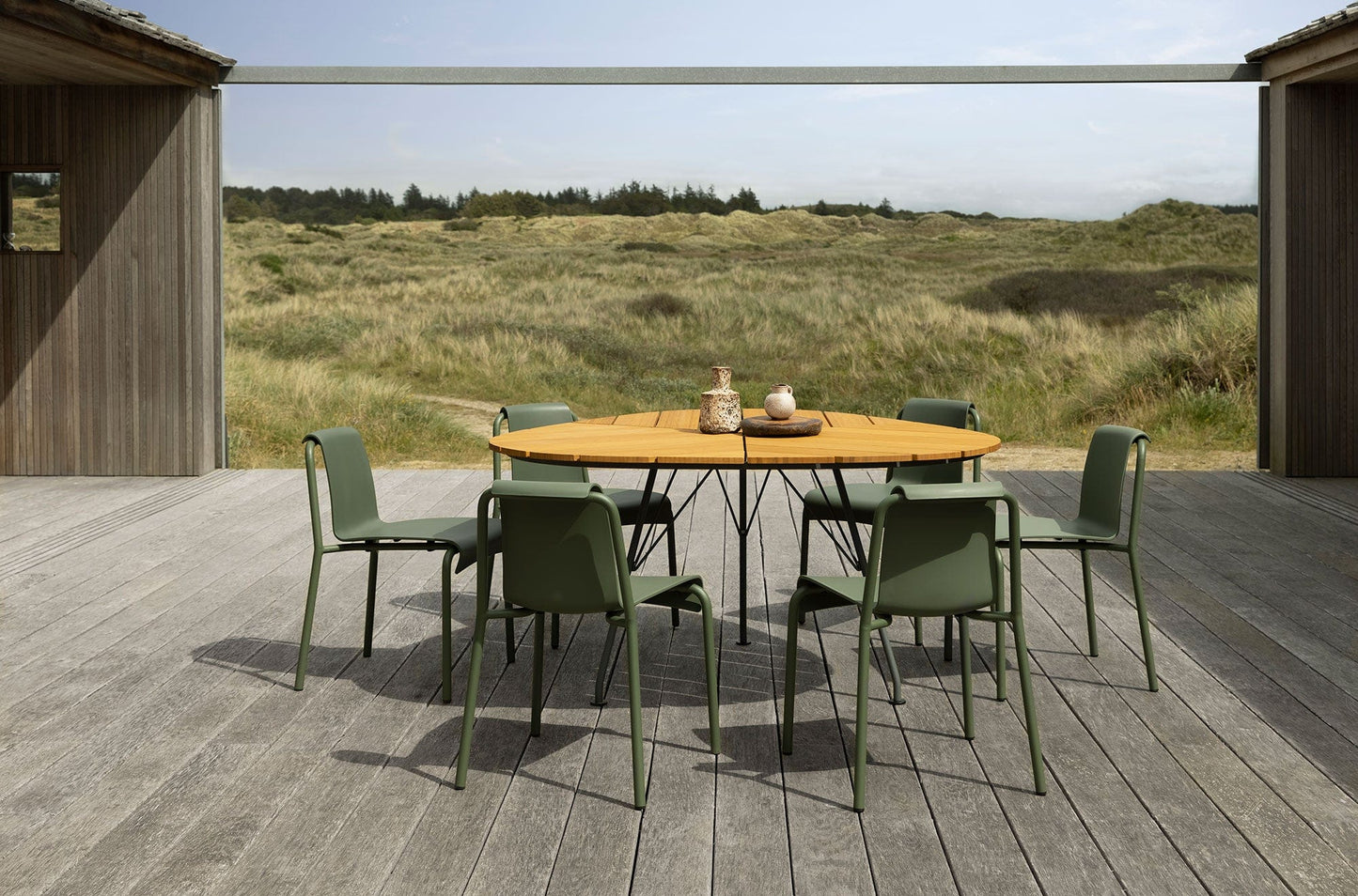 Olive green dining set on outdoor deck