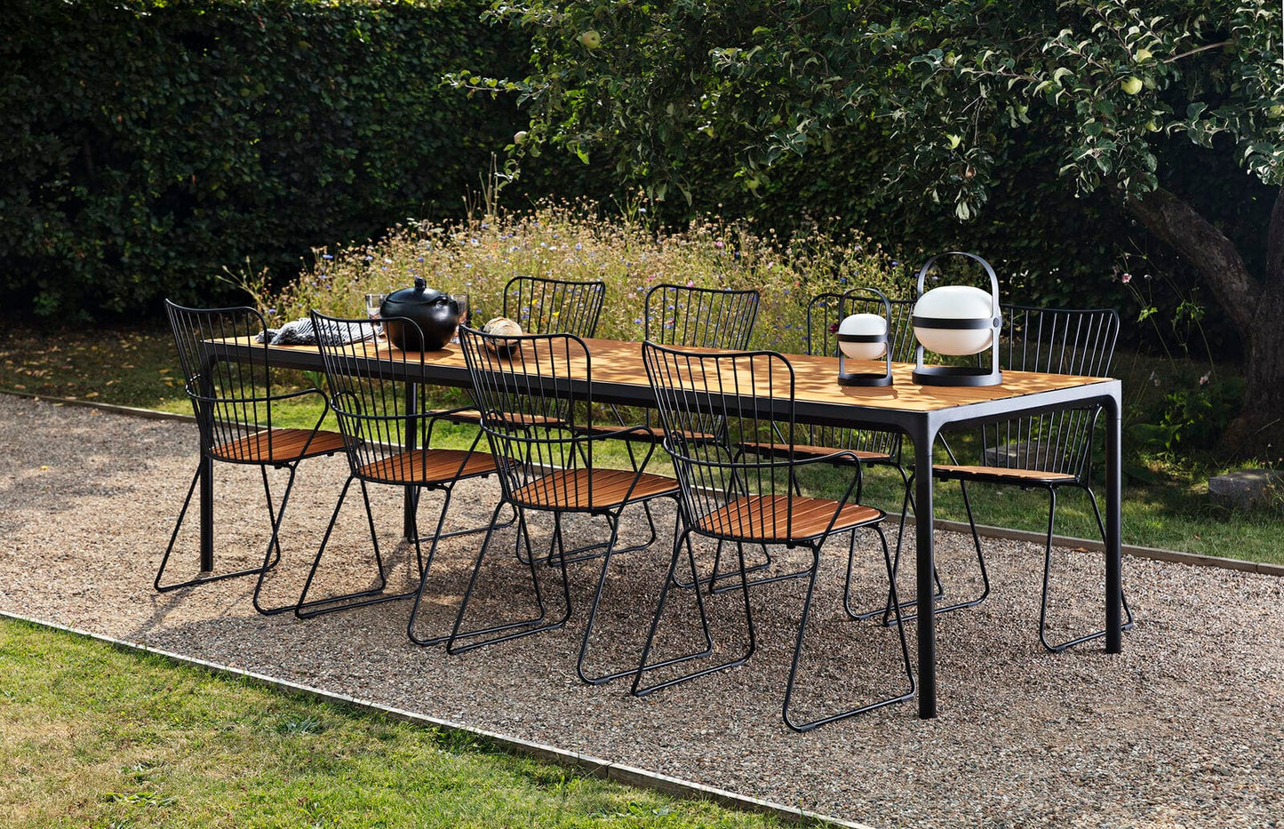 Black dining table set with bamboo chairs