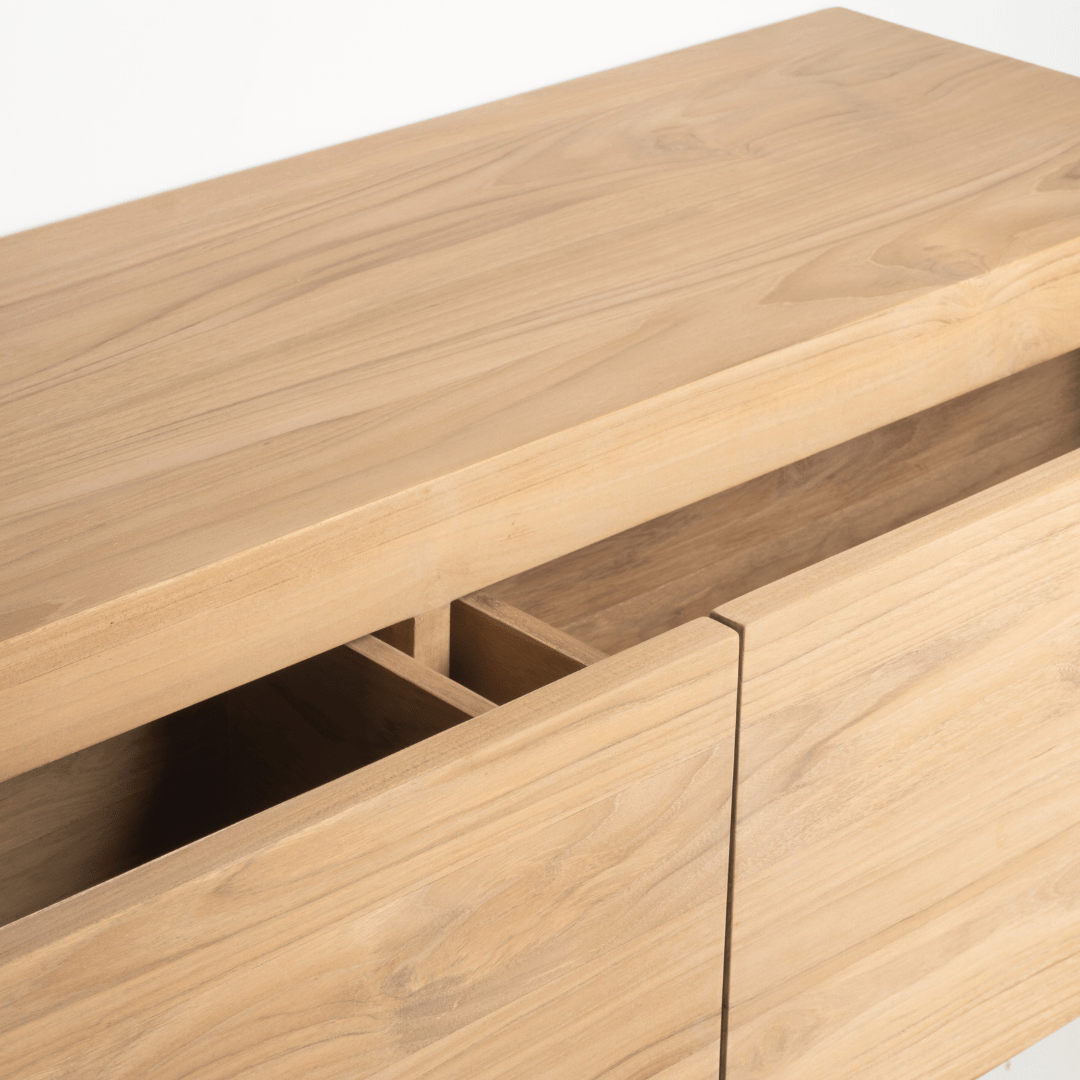 Wooden dresser with open drawers