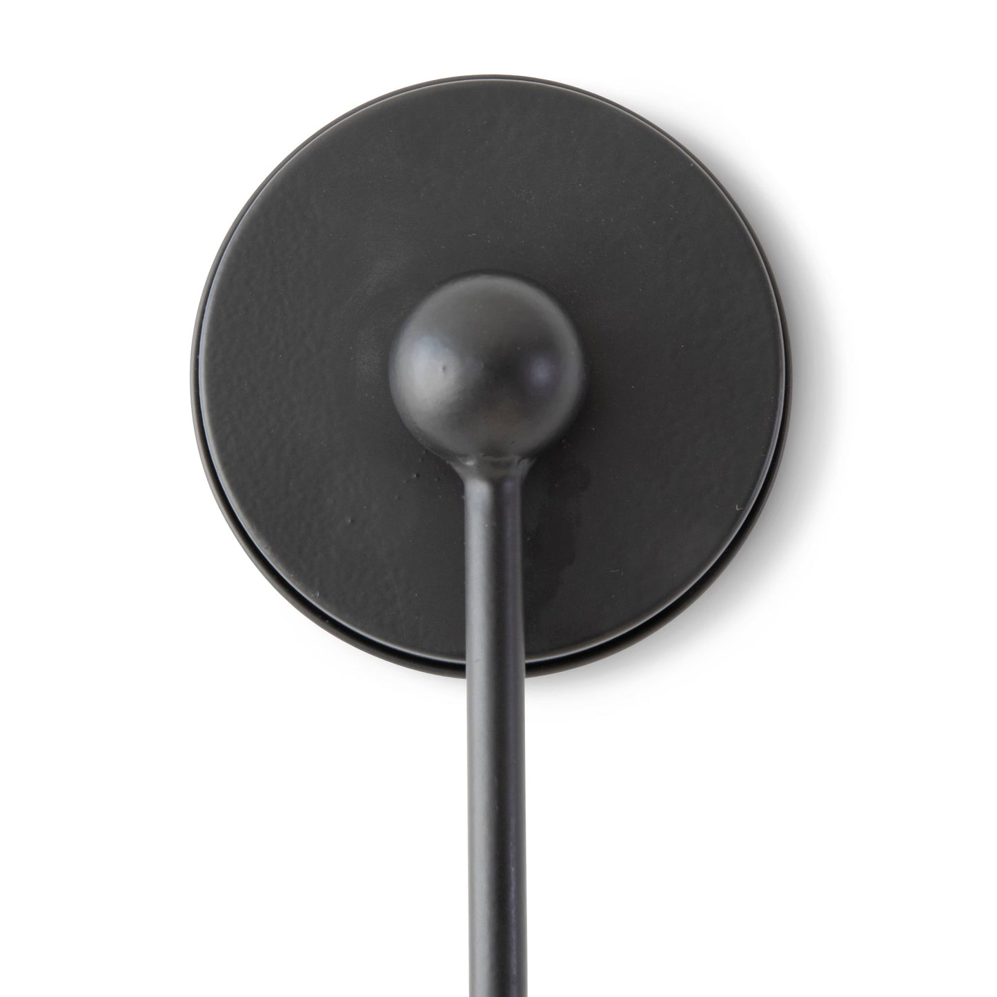Black metal wall sconce detail