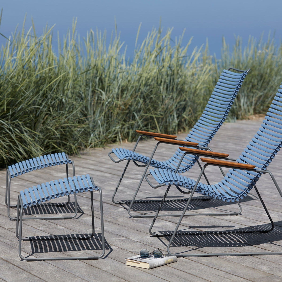 Blue click footstool and chairs on a deck