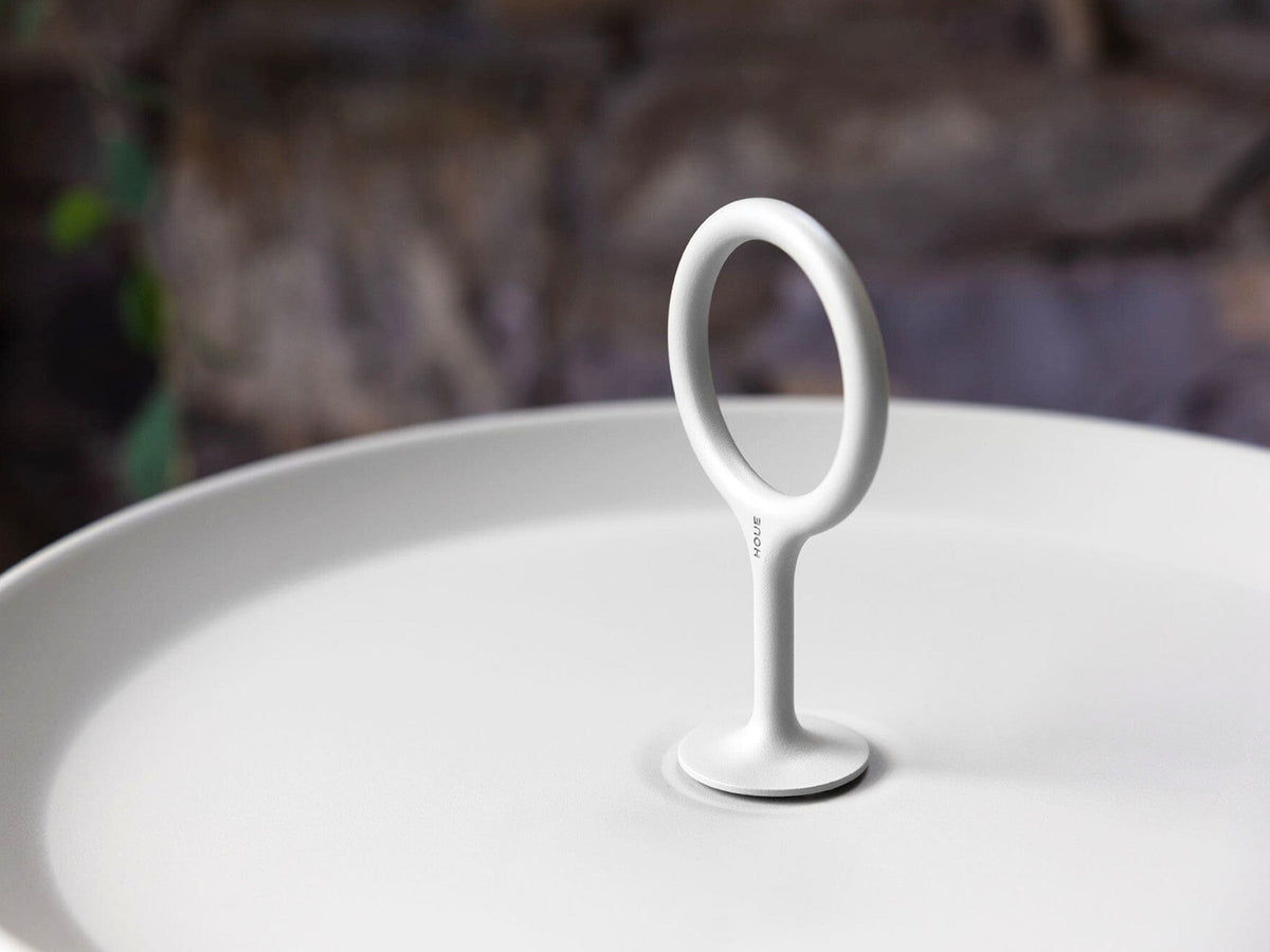 White eyelet handle on muted white plate
