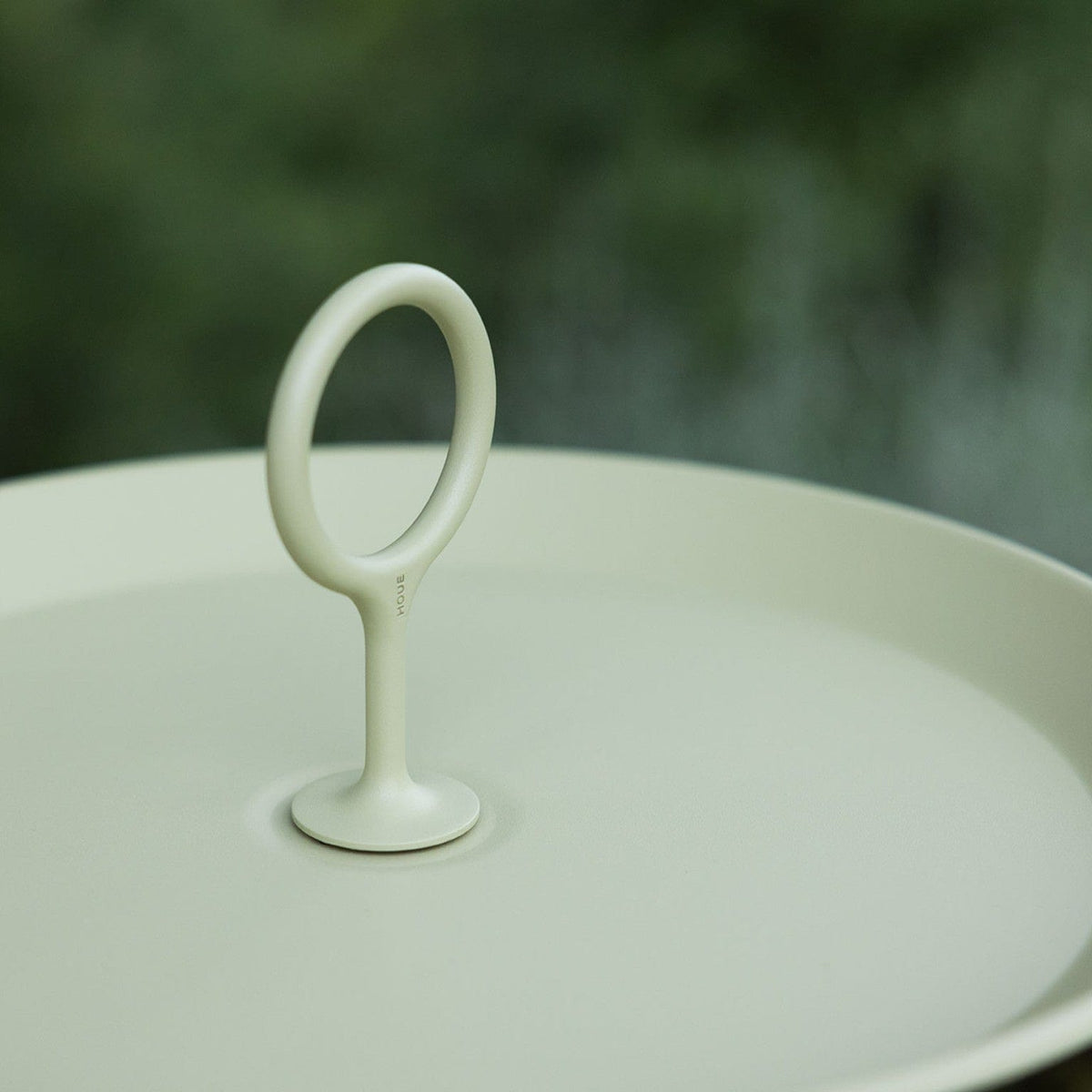 Pistachio eyelet tray with handle.