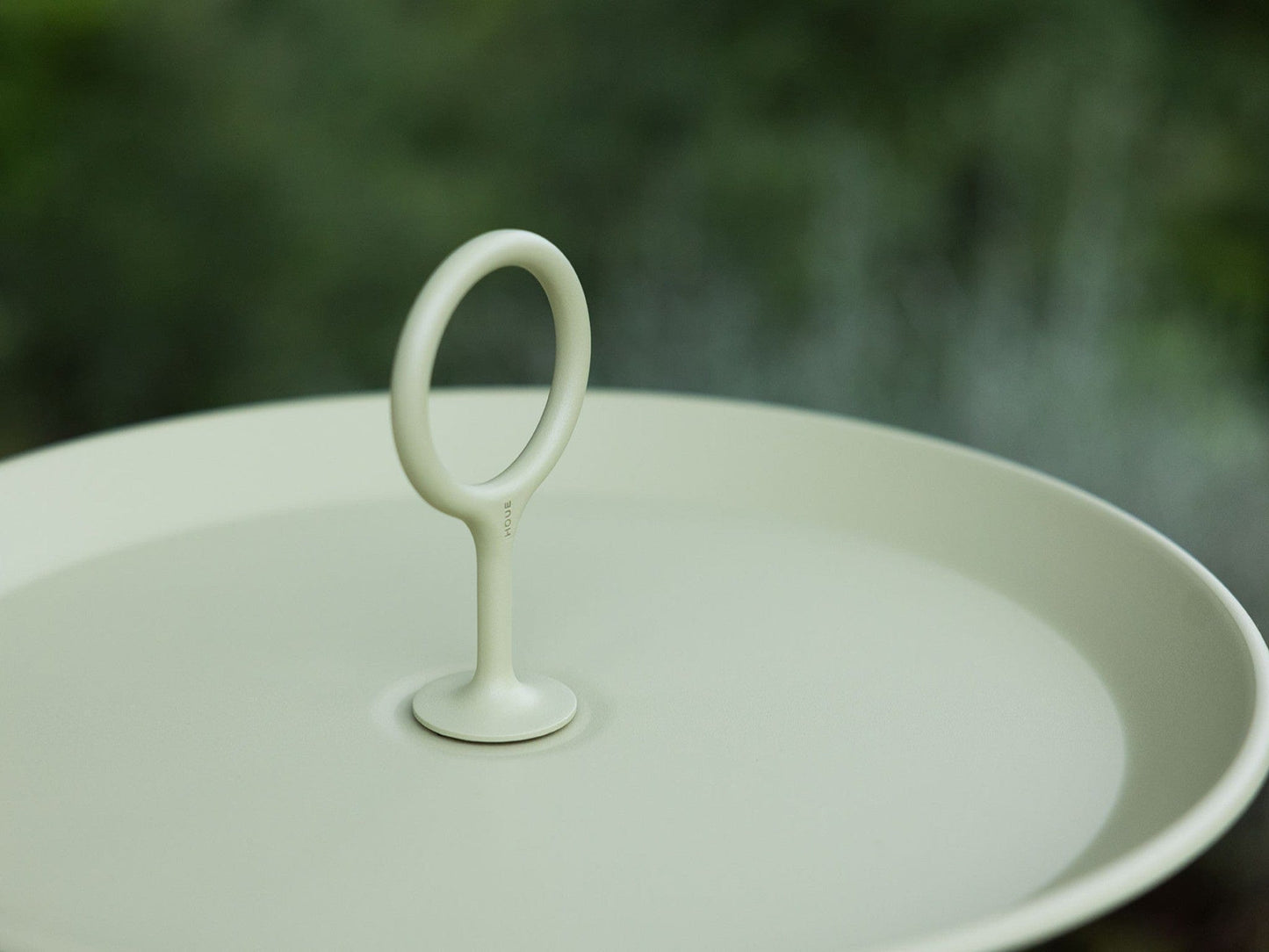 Pistachio eyelet tray with handle.