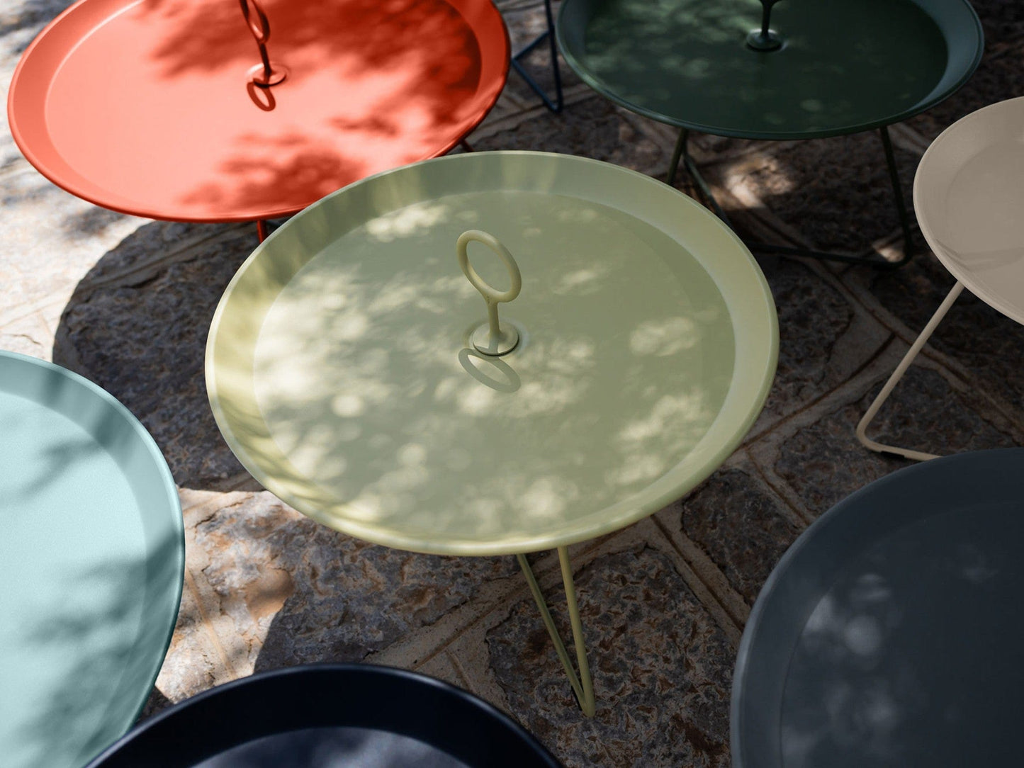 Eyelet tray tables in various colors