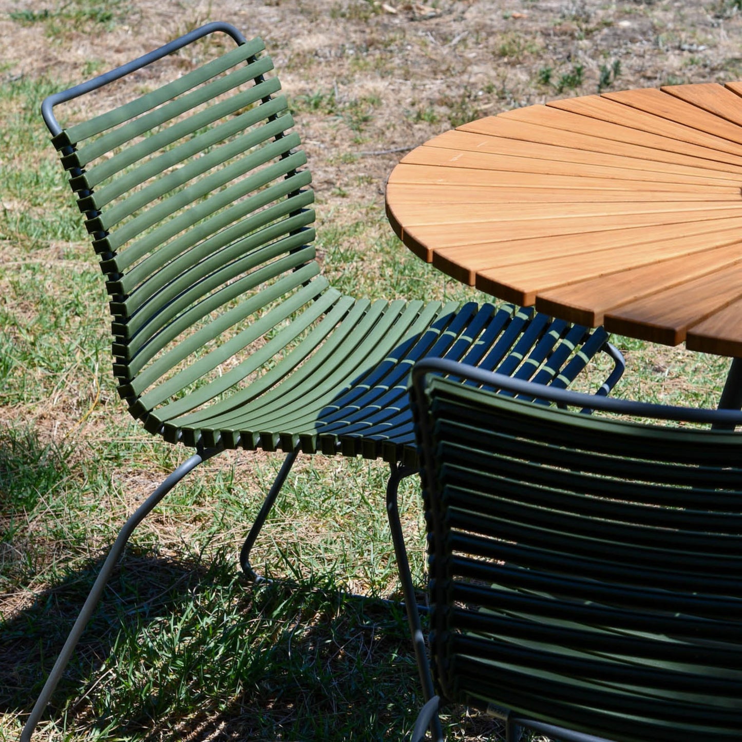 Green olive click chairs and wood table set
