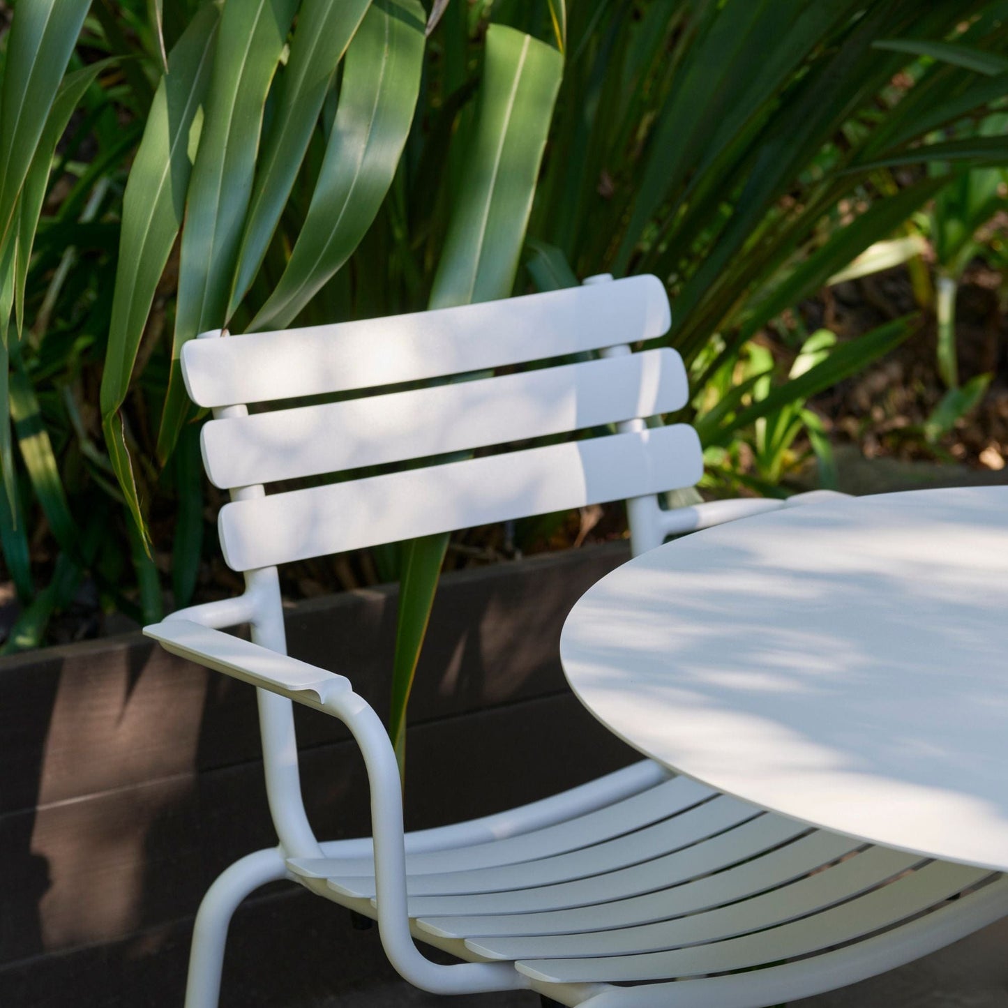 White outdoor chair and table
