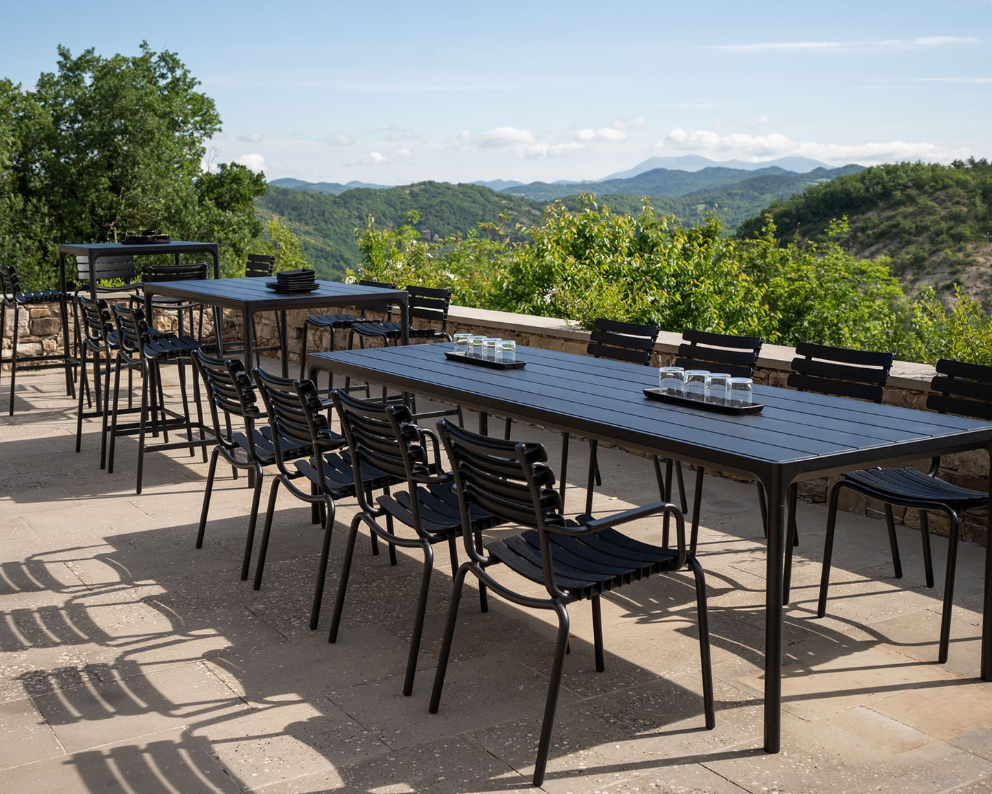 Outdoor dining tables and chairs with mountain view