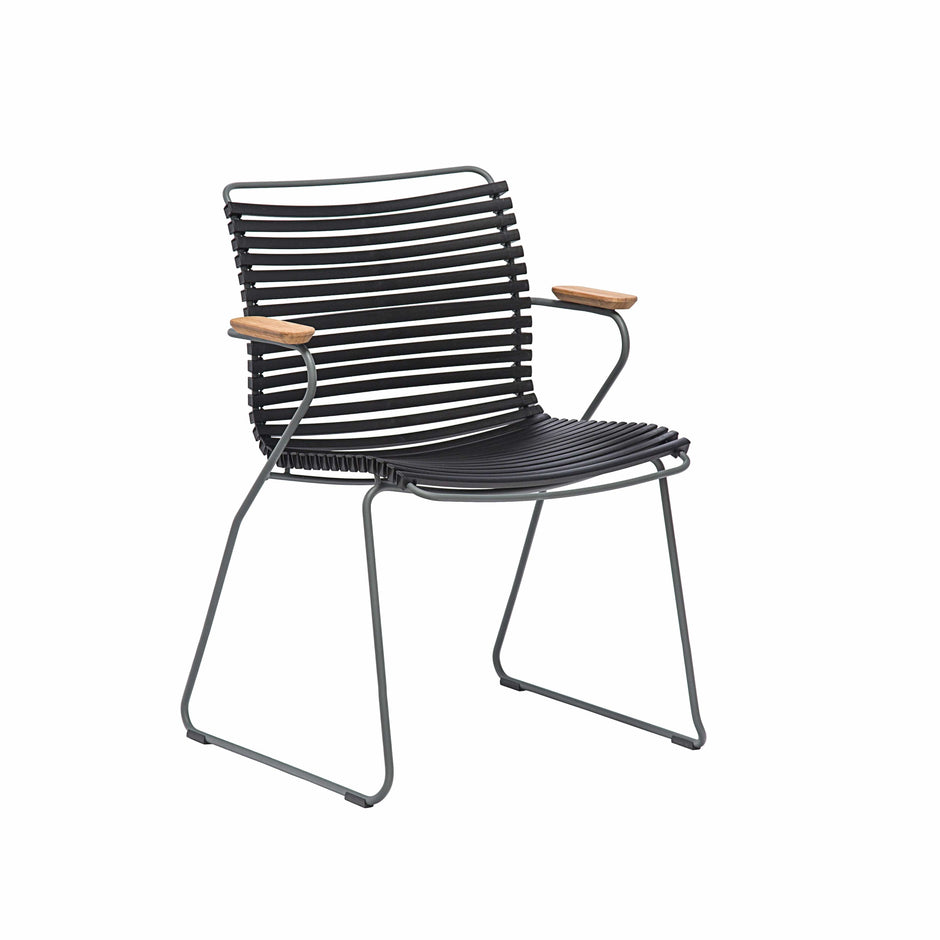 Black dining chair with wood armrests