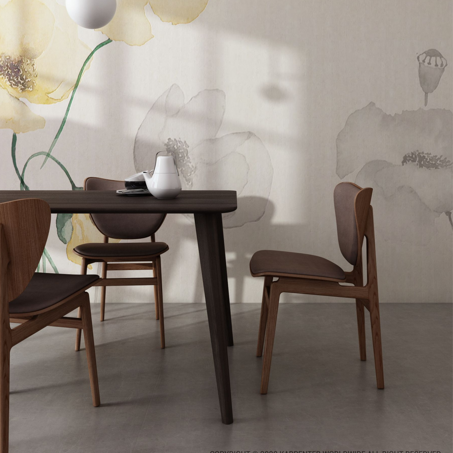 Dining room table and chairs with floral wallpaper.