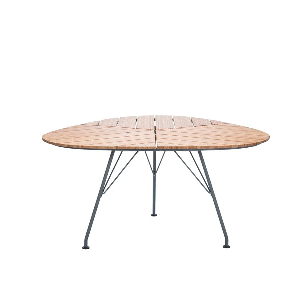 Wooden oval table with metal legs.