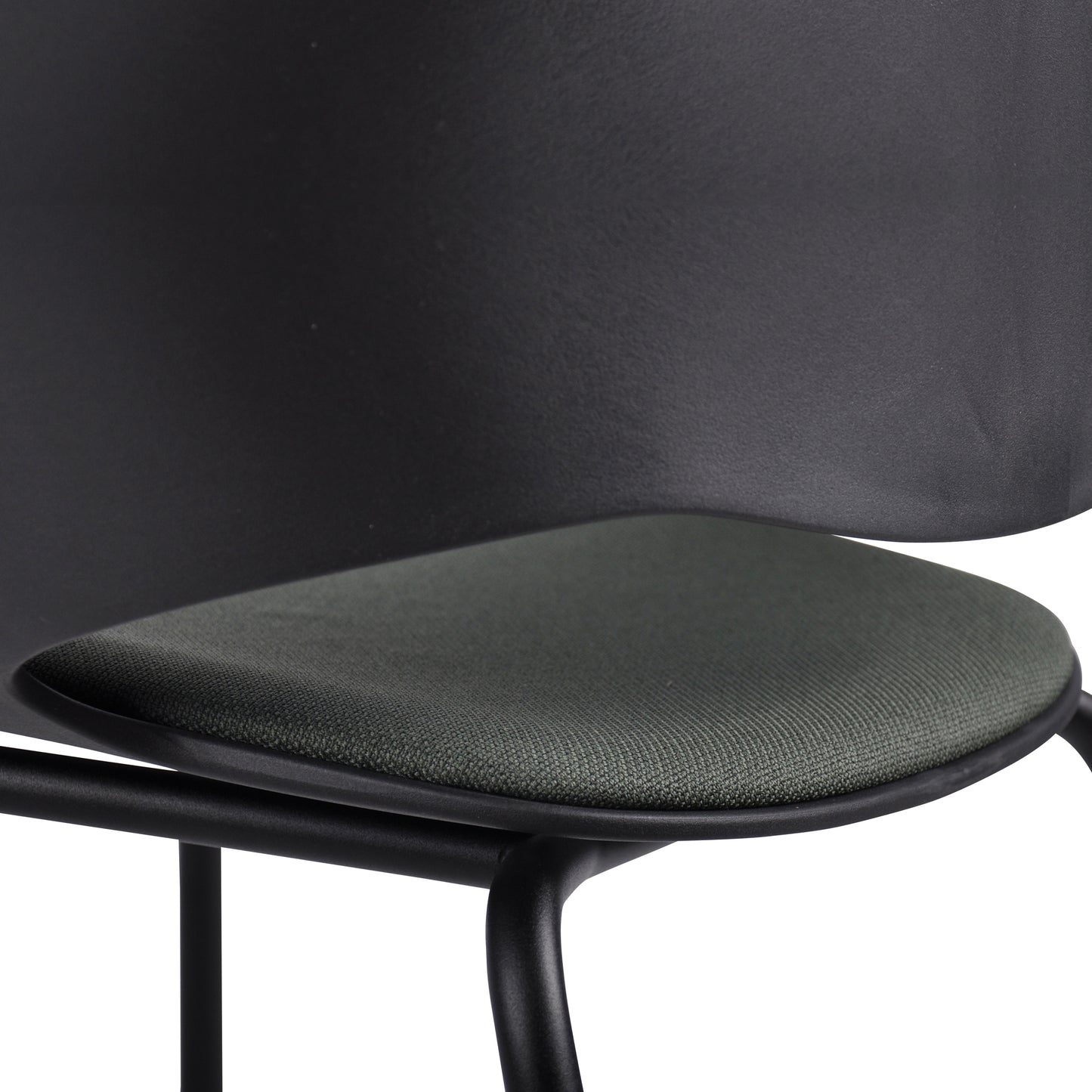 Close-up of a black chair with a gray seat.
