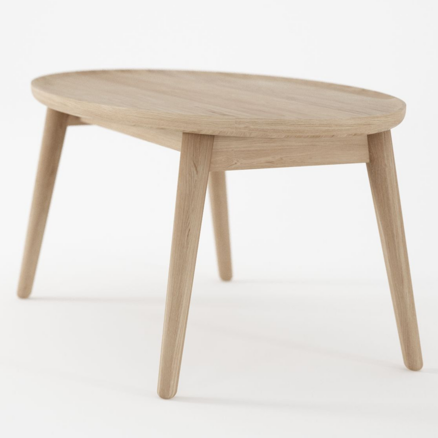 Oval wooden coffee table with four legs.