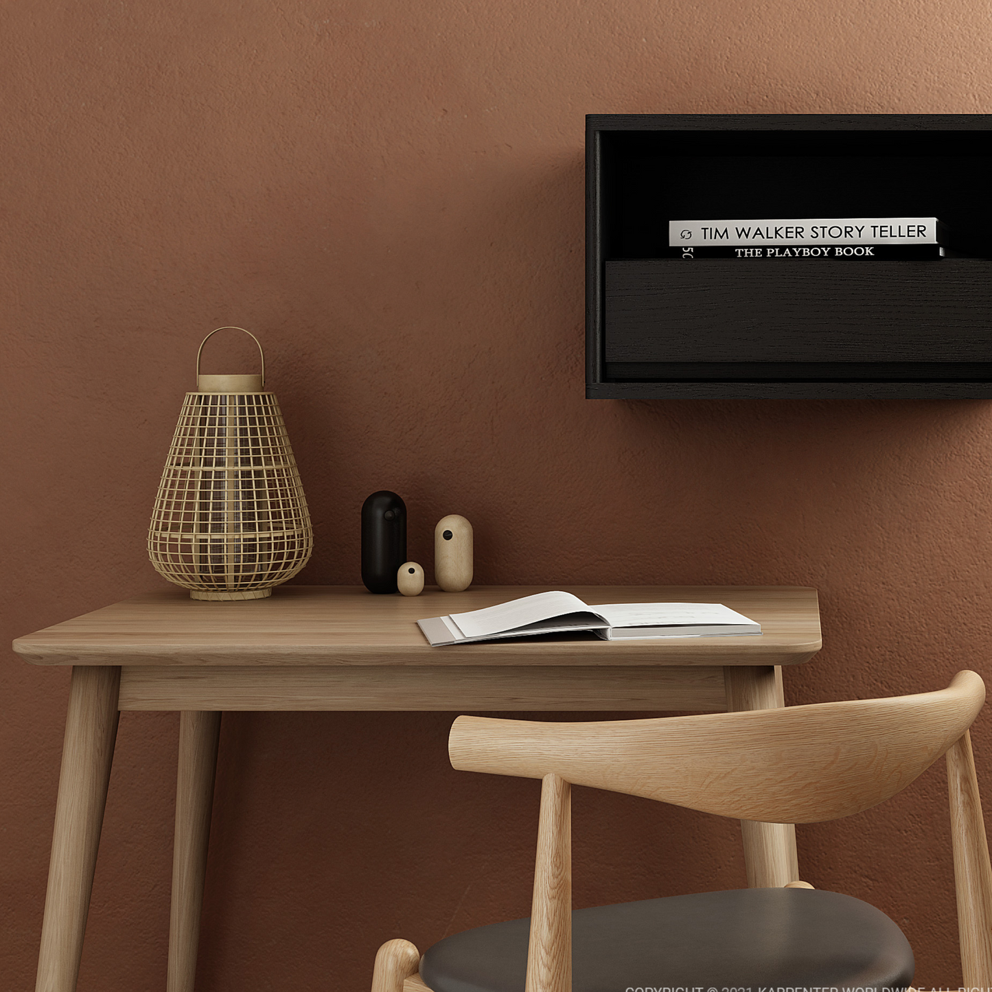 Desk with chair, books, and decor against a brown wall.