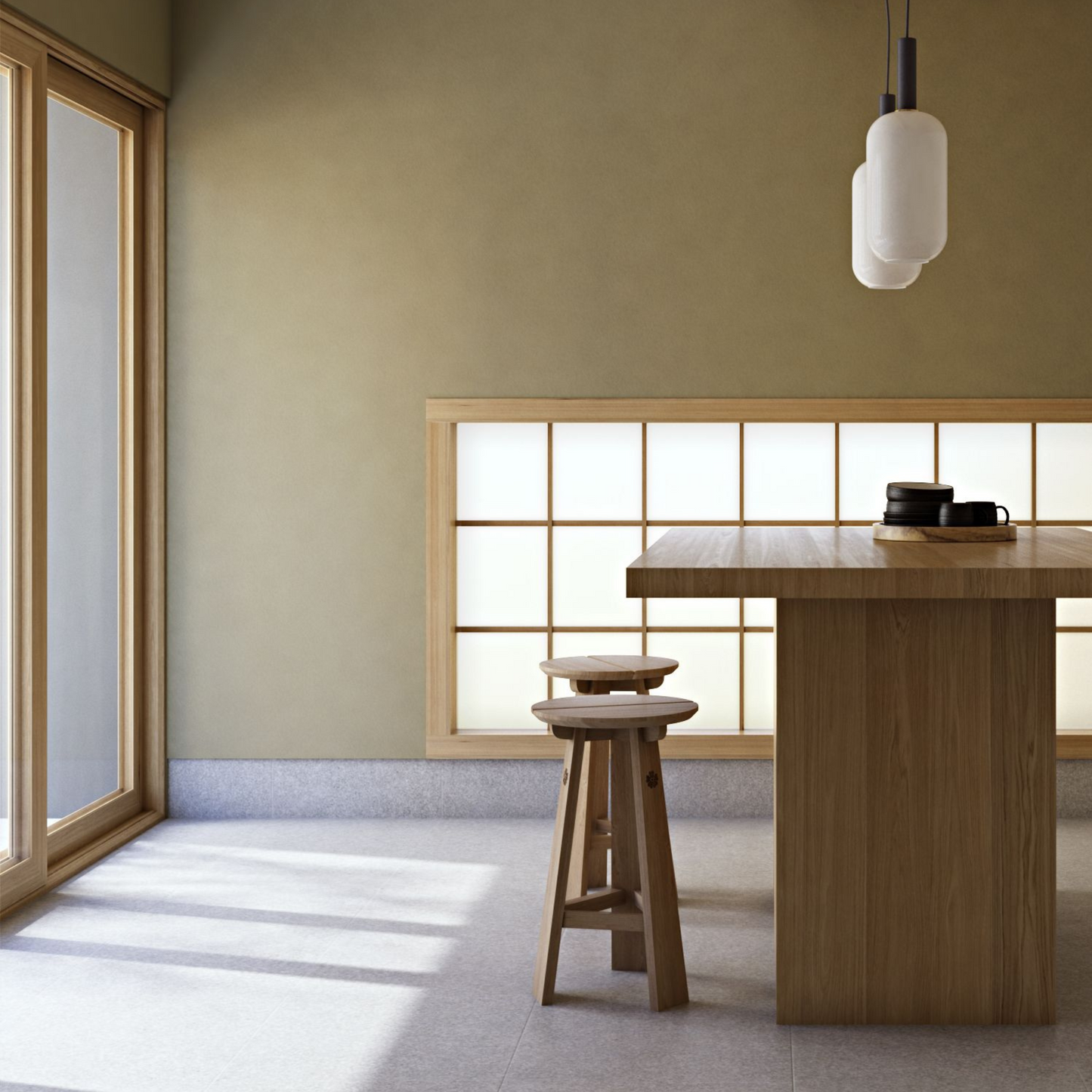 Interior with wooden table, stools, and pendant light.