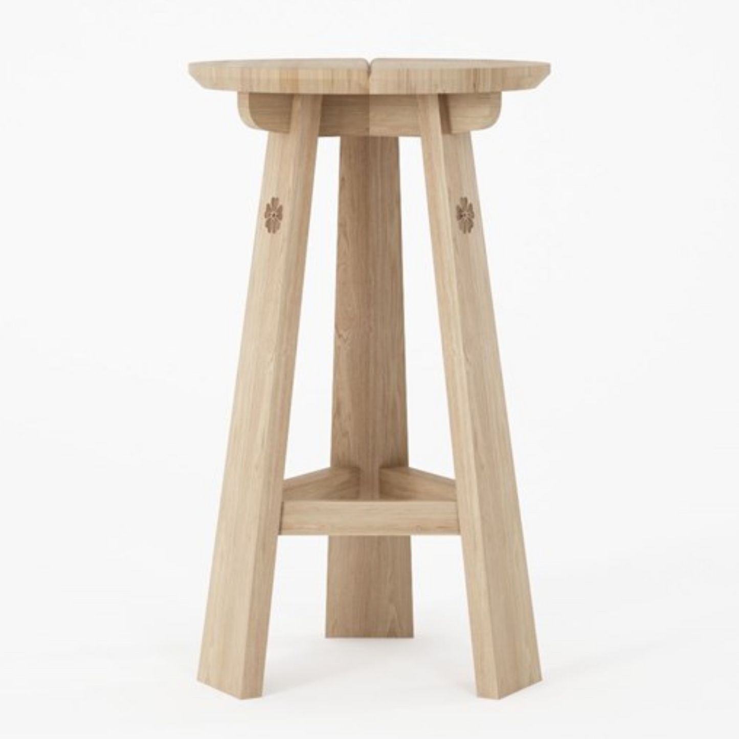 Wooden bar stool with clover details.