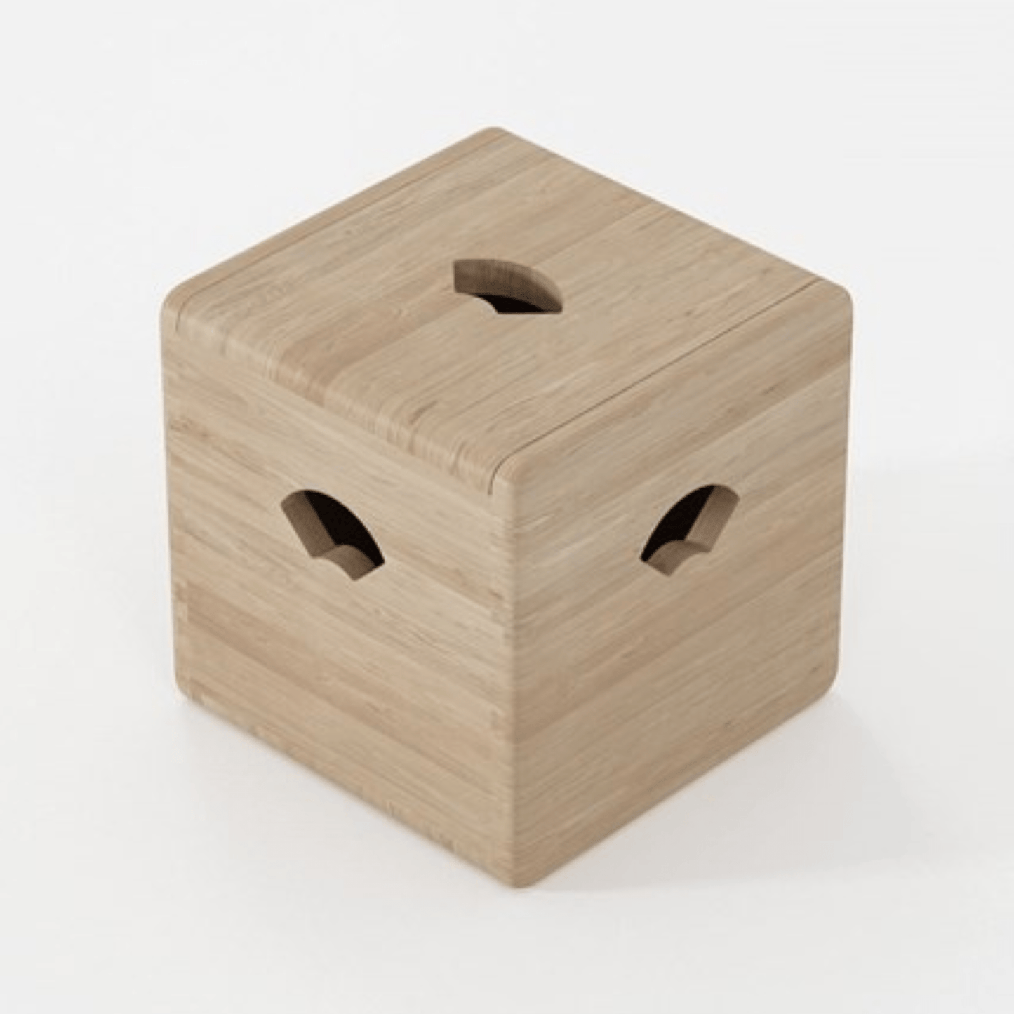 Wooden cube with curved cutouts.
