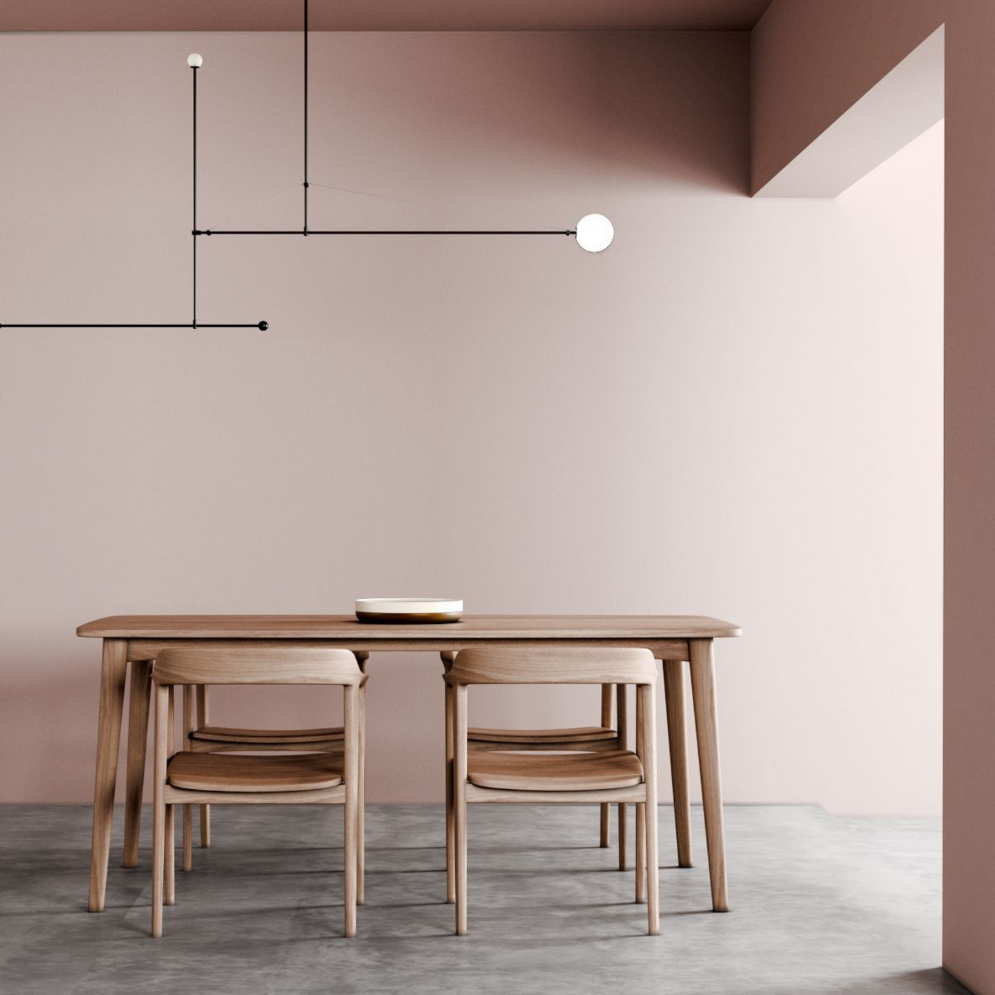 Dining room with table, chairs, and modern light fixture.