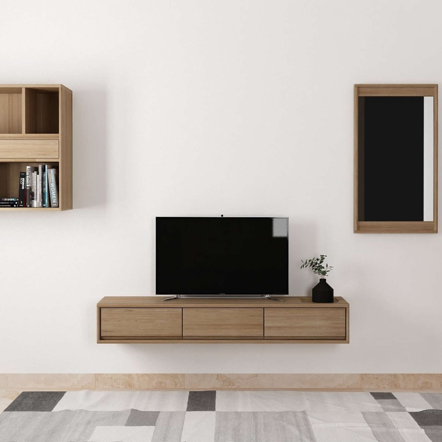 TV and wooden wall unit on a white wall.