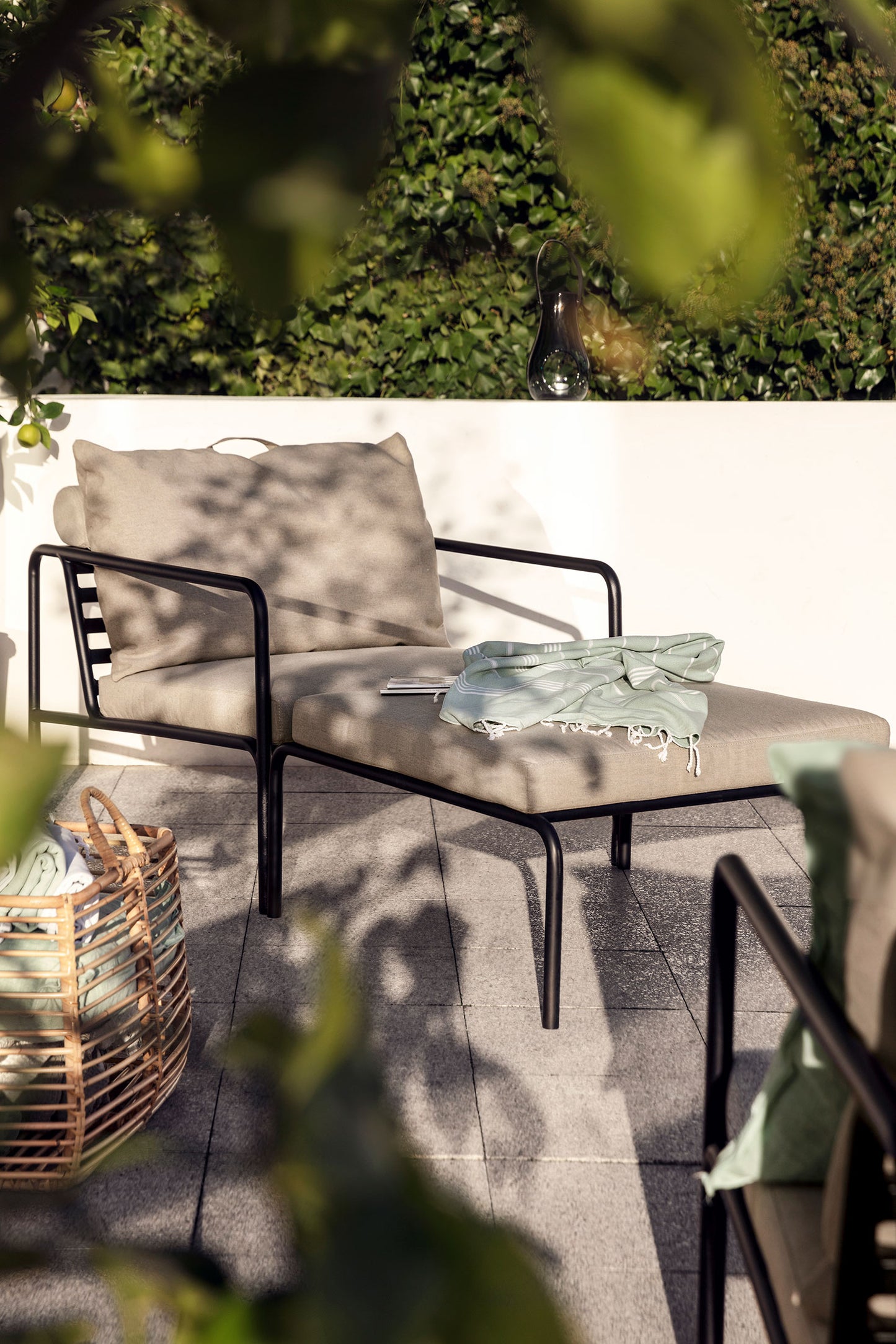 AVON chair and ottoman on patio