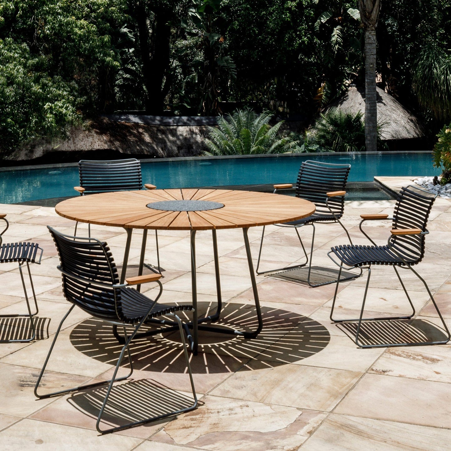 Outdoor dining set with round table and chairs