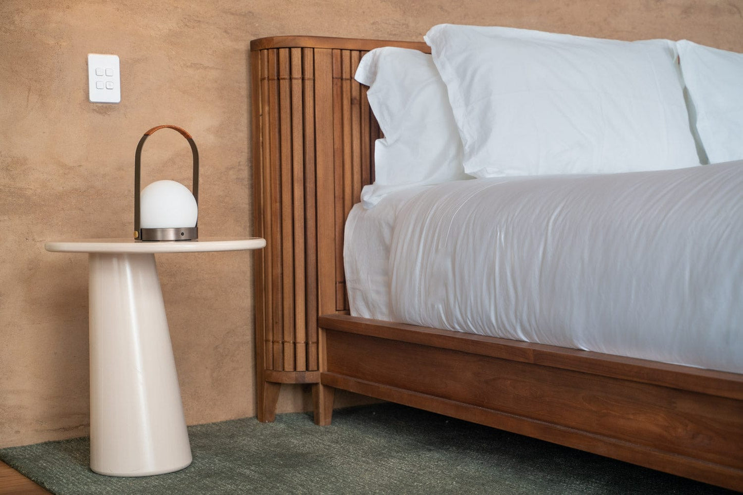 Bedroom interior with wooden bed and side table