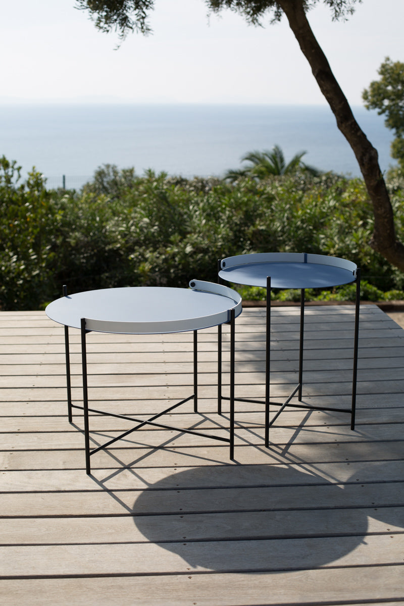 Low-res EDGE table set on deck overlooking ocean