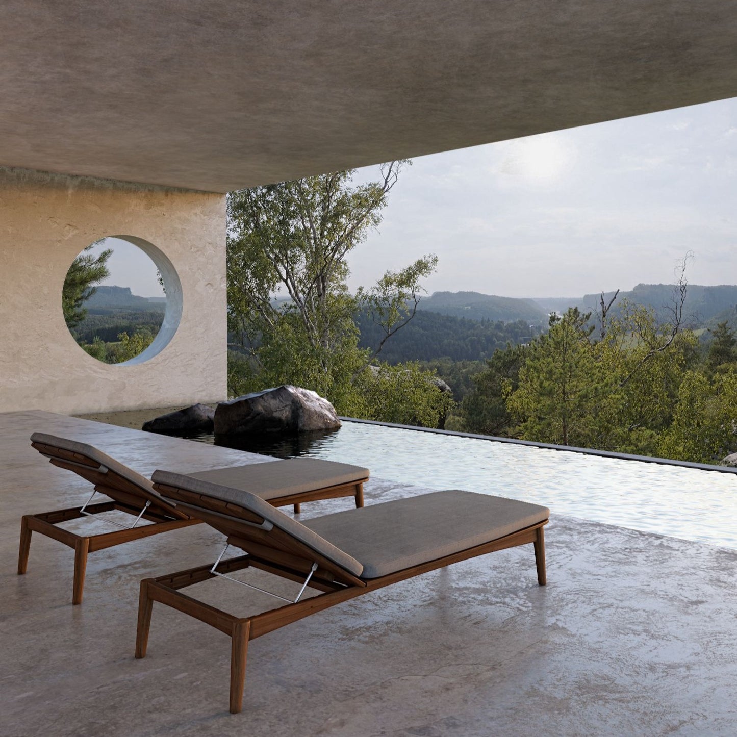 Grasshopper outdoor sunbeds overlooking mountain view