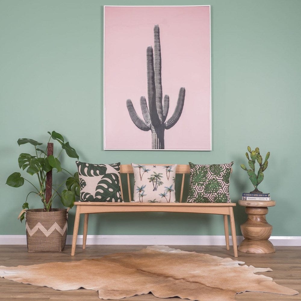 Cactus art & tropical cushions on bench