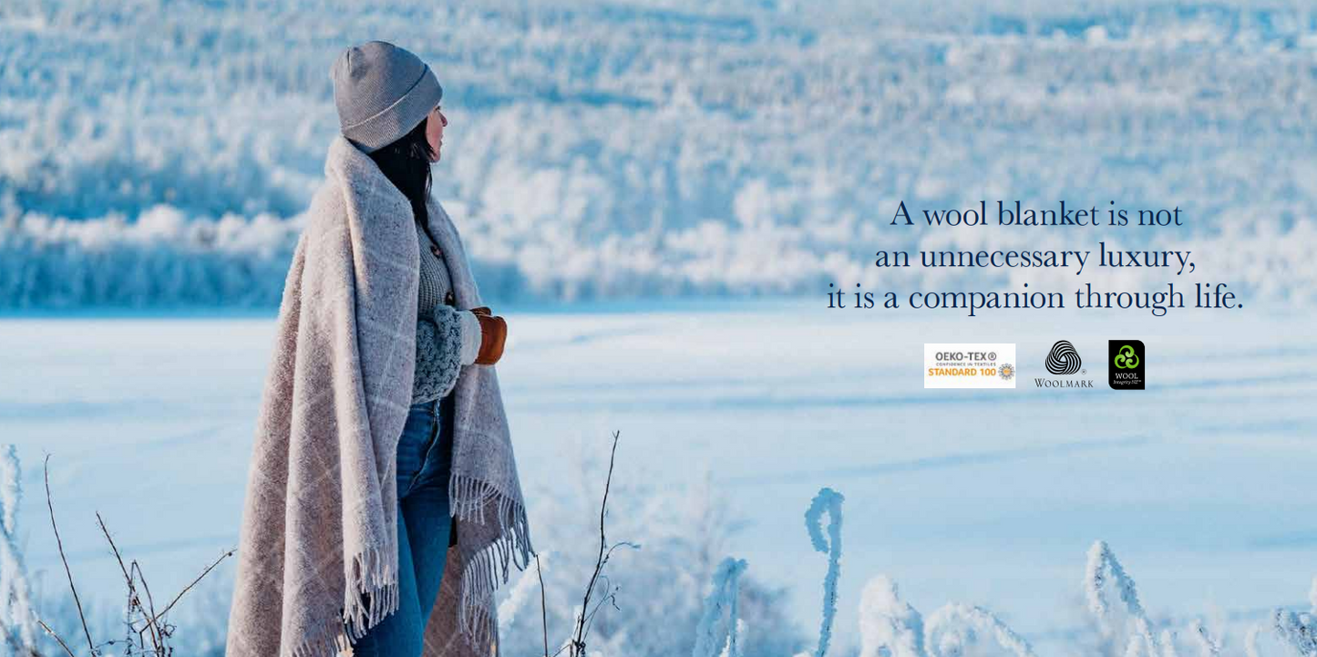 Woman in winter with wool blanket