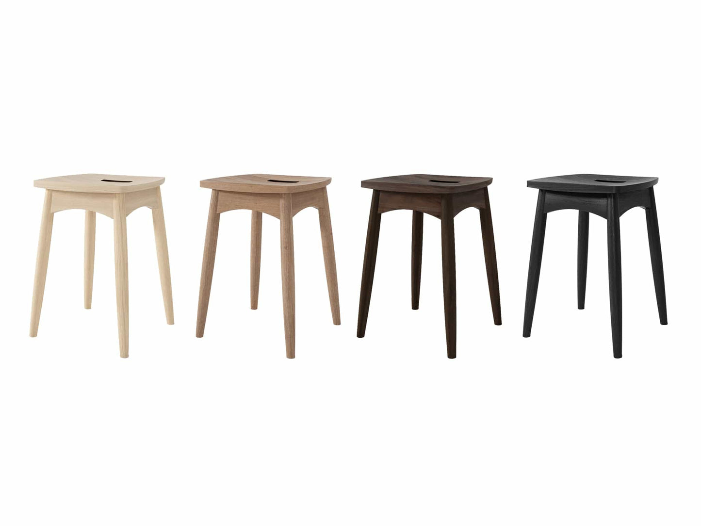 Set of four wooden stools in various colors