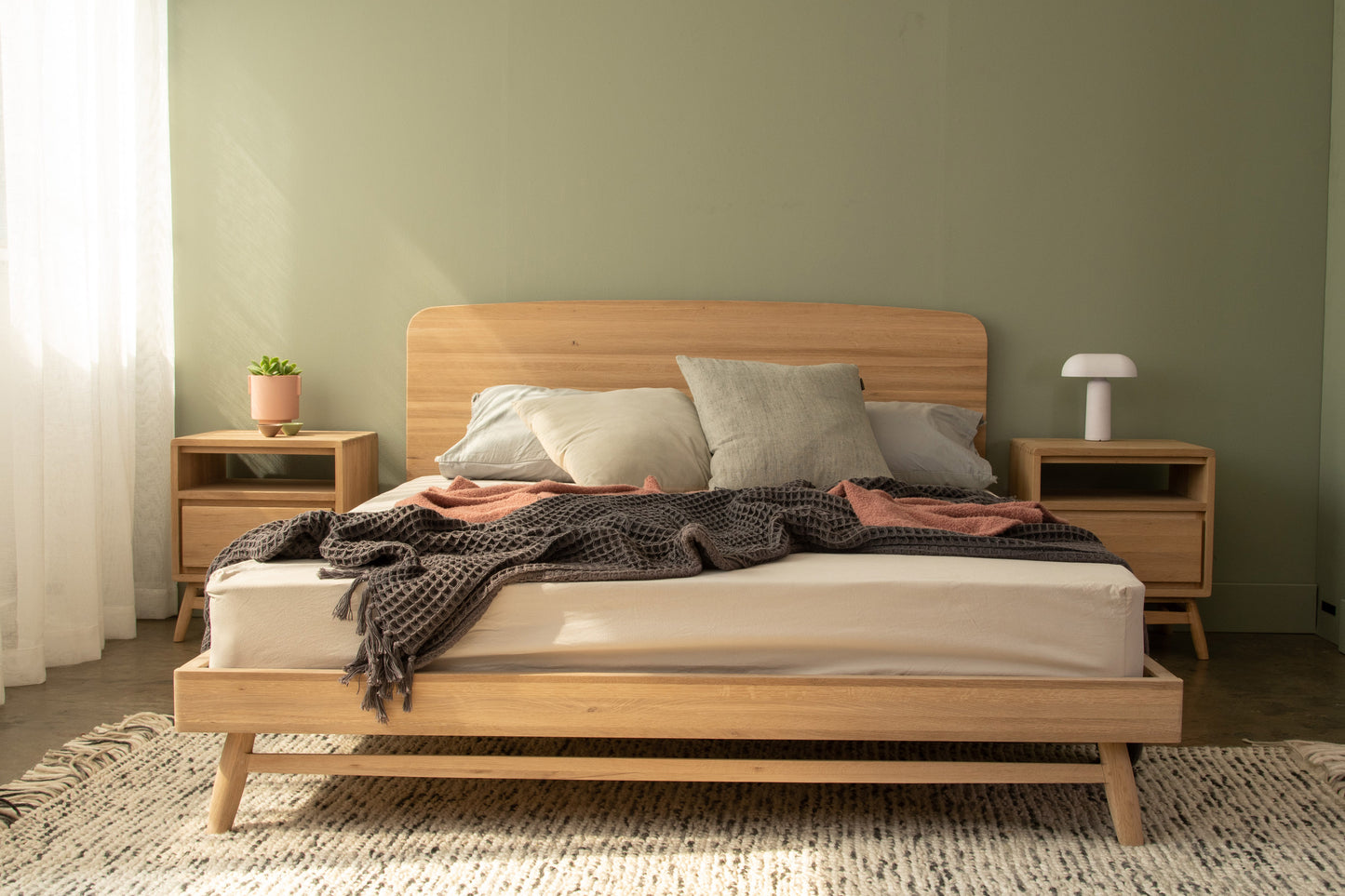 KT031OKT033O bed frame with bedding and decor