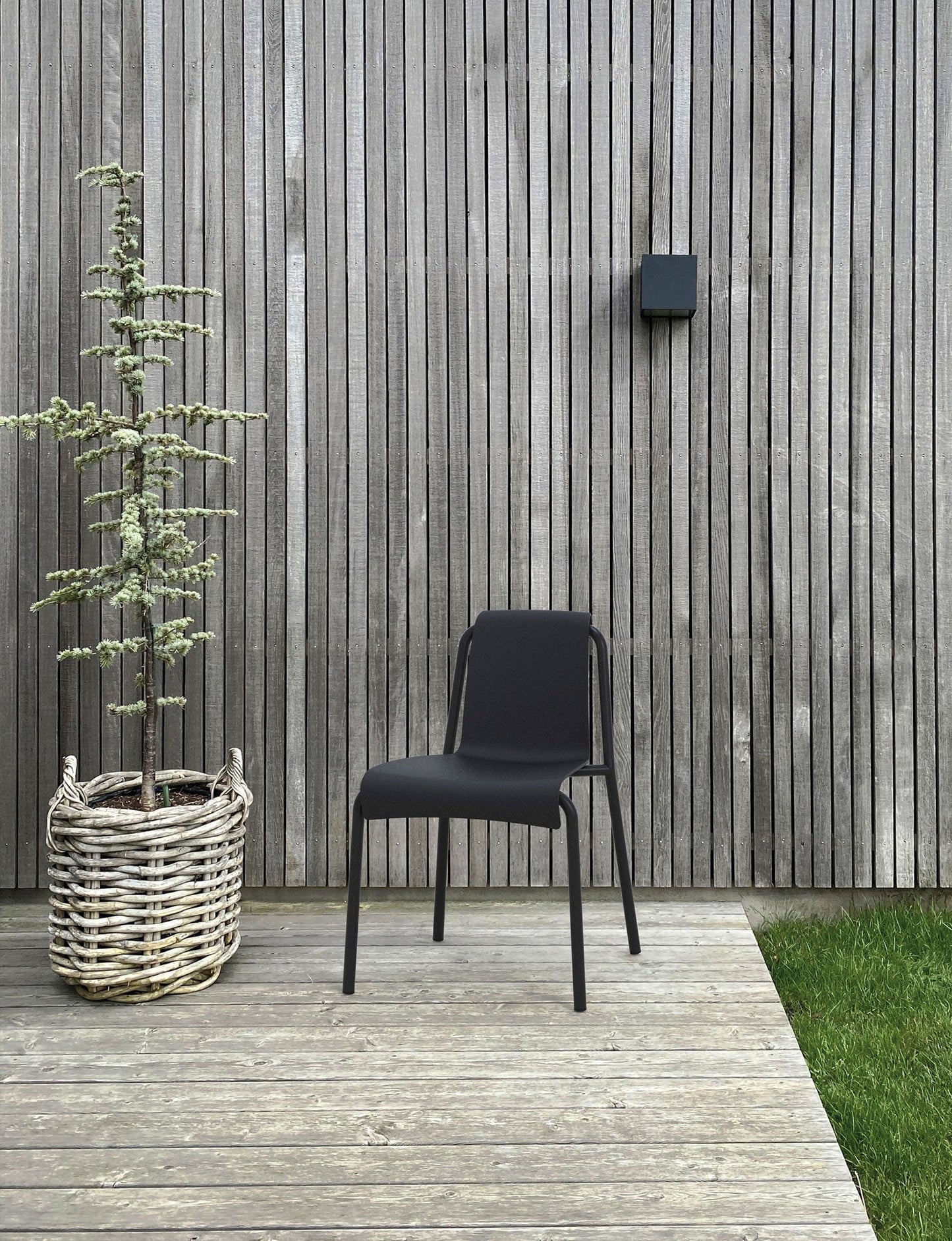 NAMI Black Chair on wooden deck