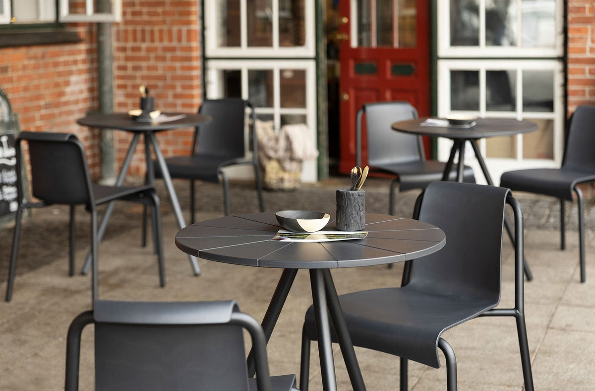 NAMI chair and cafe table set on outdoor patio