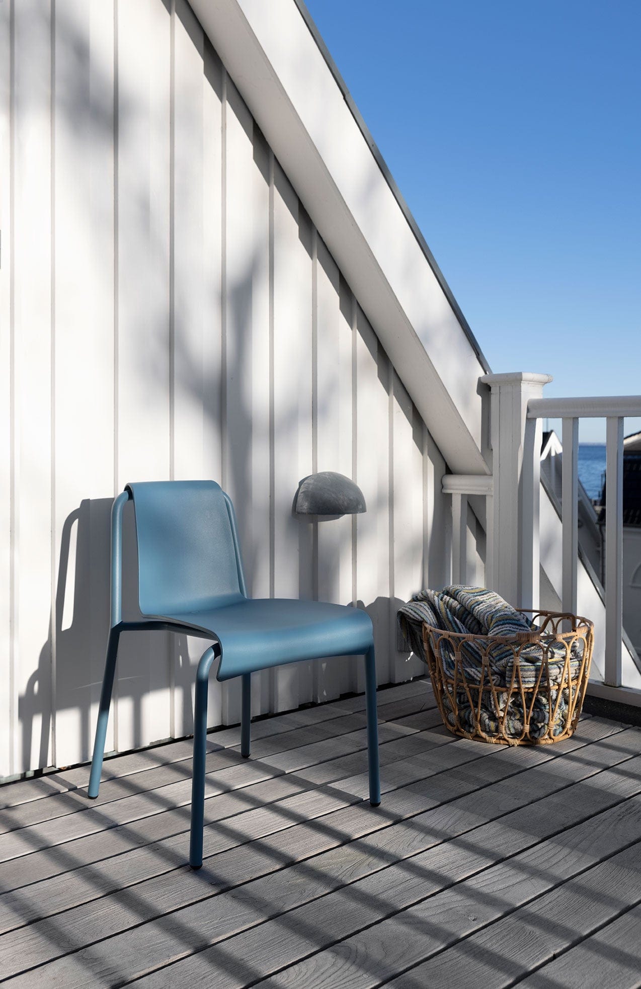 NAMI Chair HOL6638 on deck with seaside view