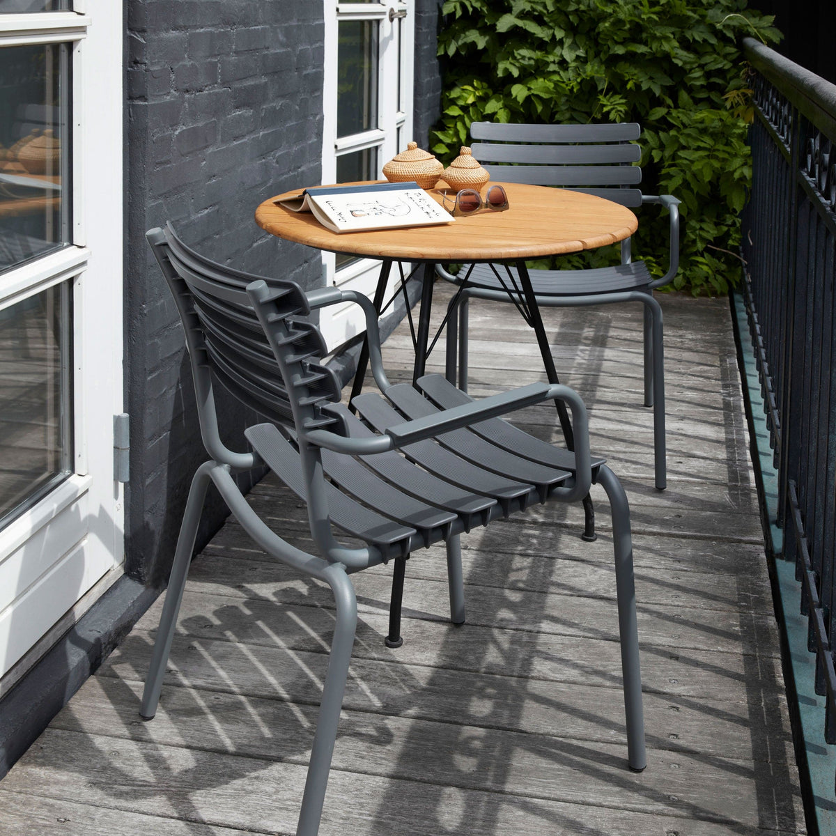 ReCLIPS bamboo outdoor table and chairs on balcony