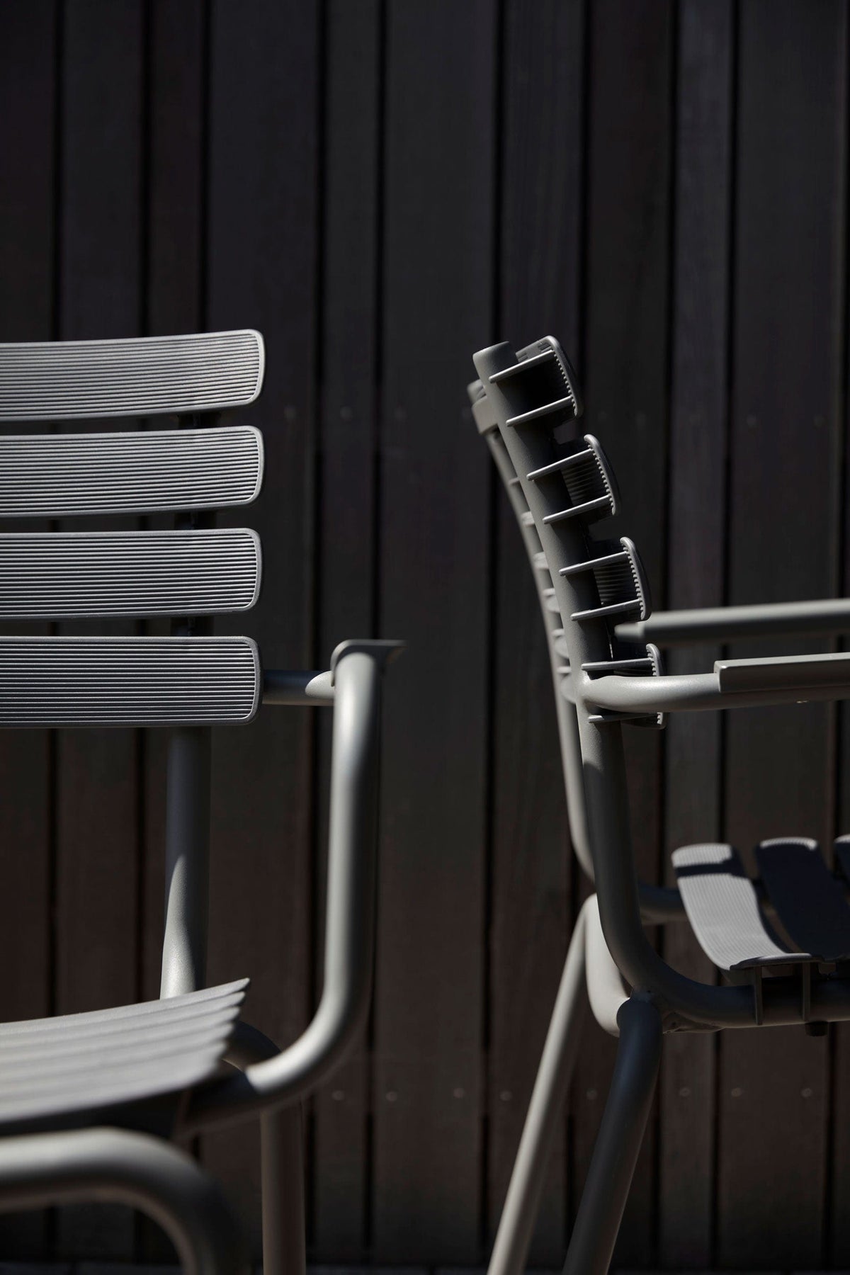 ReCLIPS chair closeup against wood background