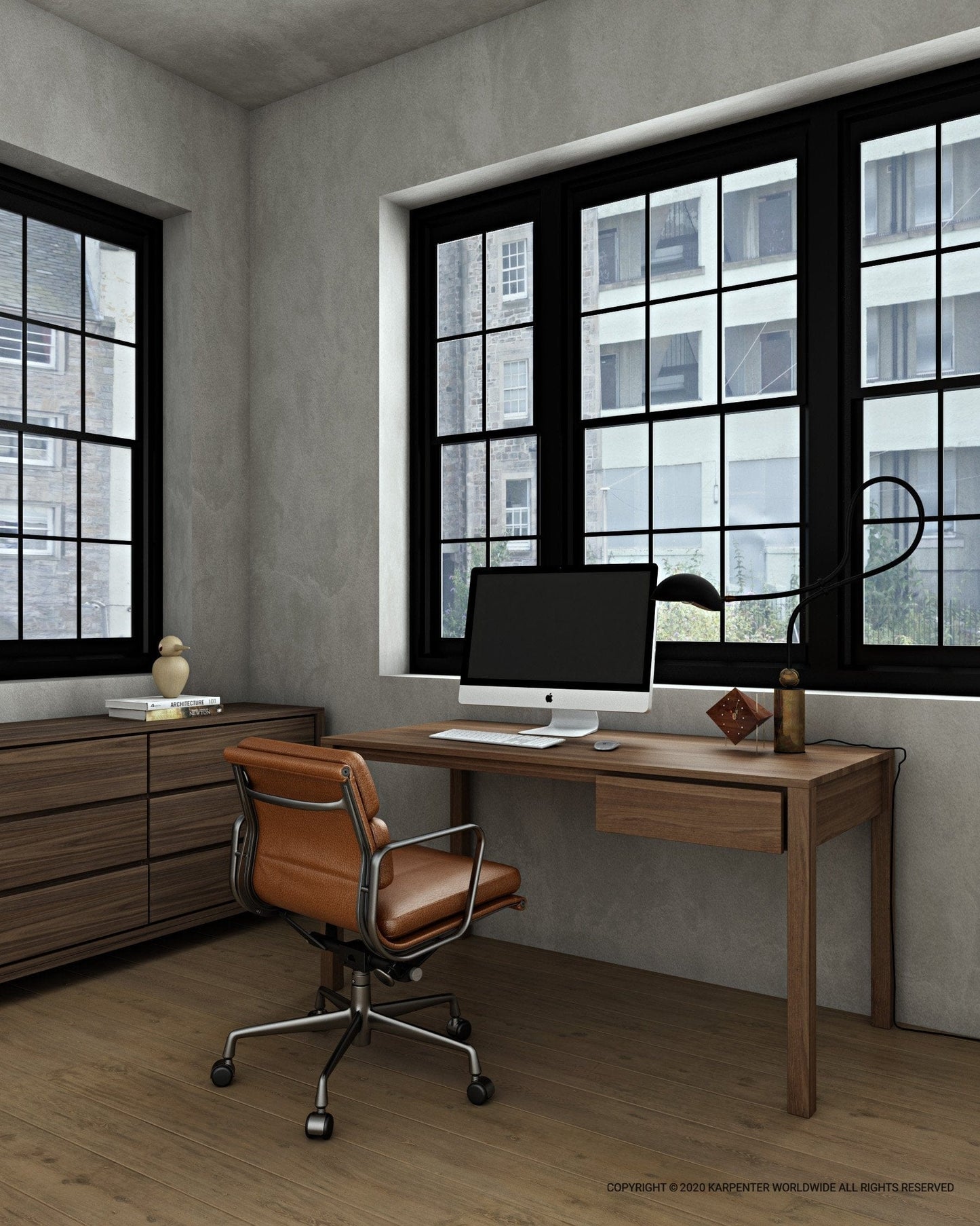 Solid office desk with computer and chair by window