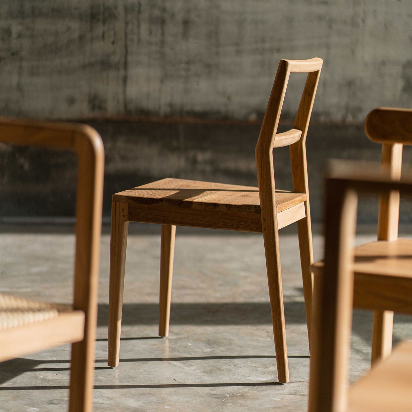 TRE012_5 wooden chair in sunlight