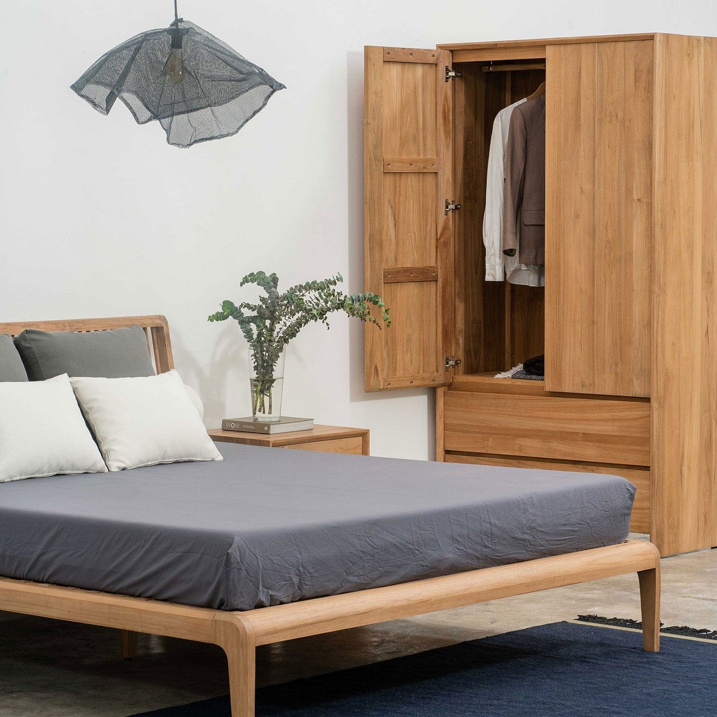 Timber frame bed and wardrobe in bedroom