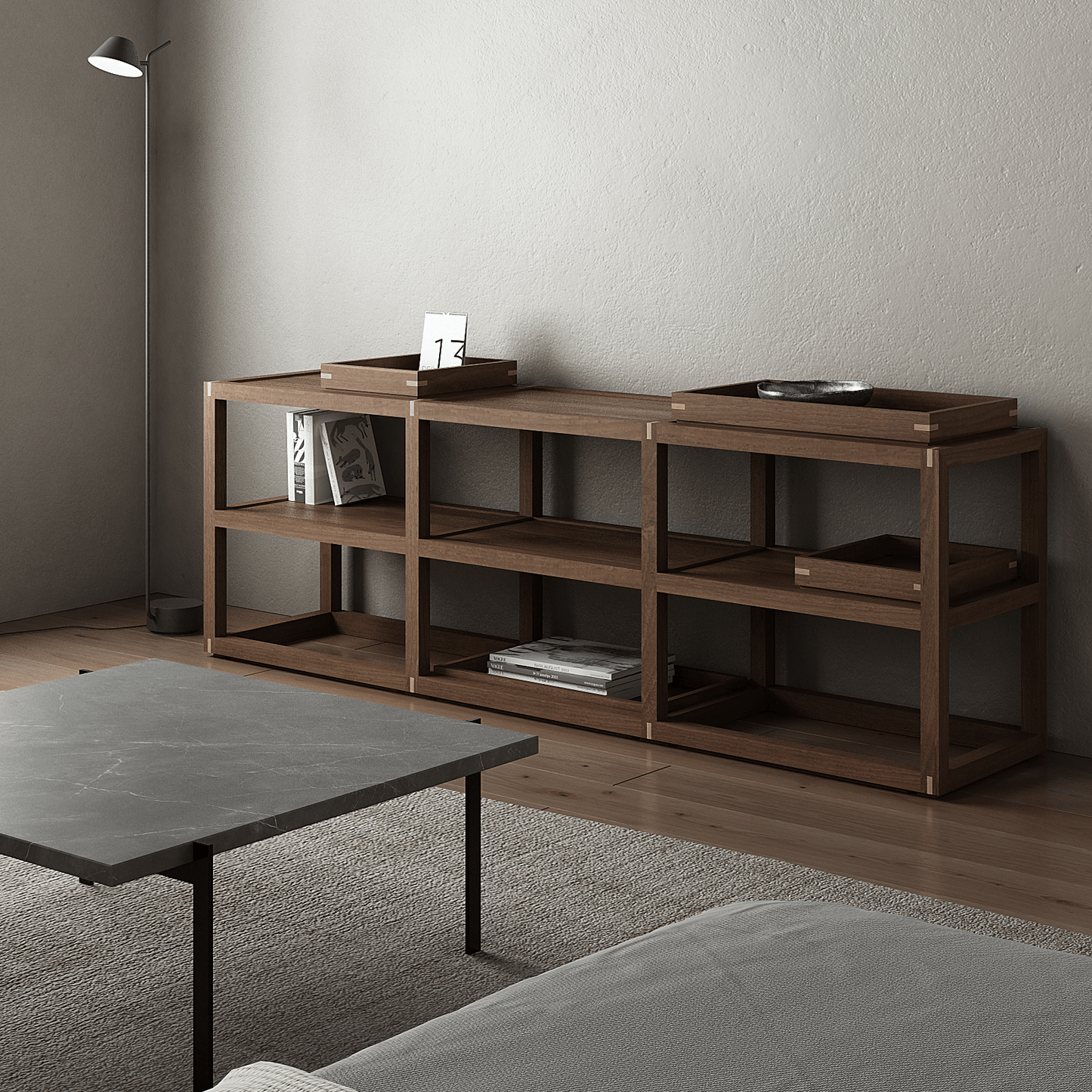 Horizontal wooden rack with trays, books, and decor
