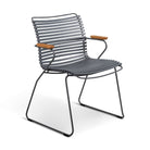 Gray metal chair with wooden armrests.