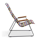 Lounge chair with colorful woven seat and wooden armrests.