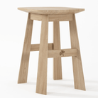 Wooden stool with triangular seat.