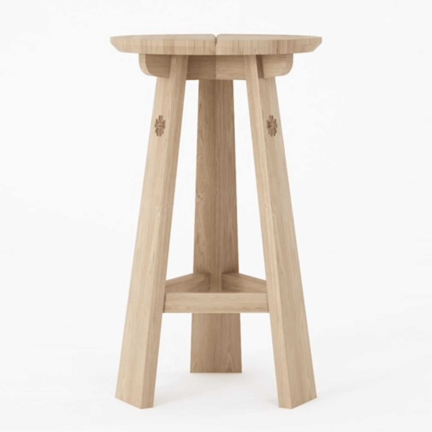 Wooden bar stool with clover details.
