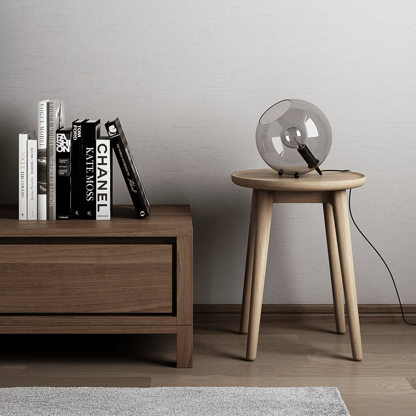 Wooden side table with lamp and books.