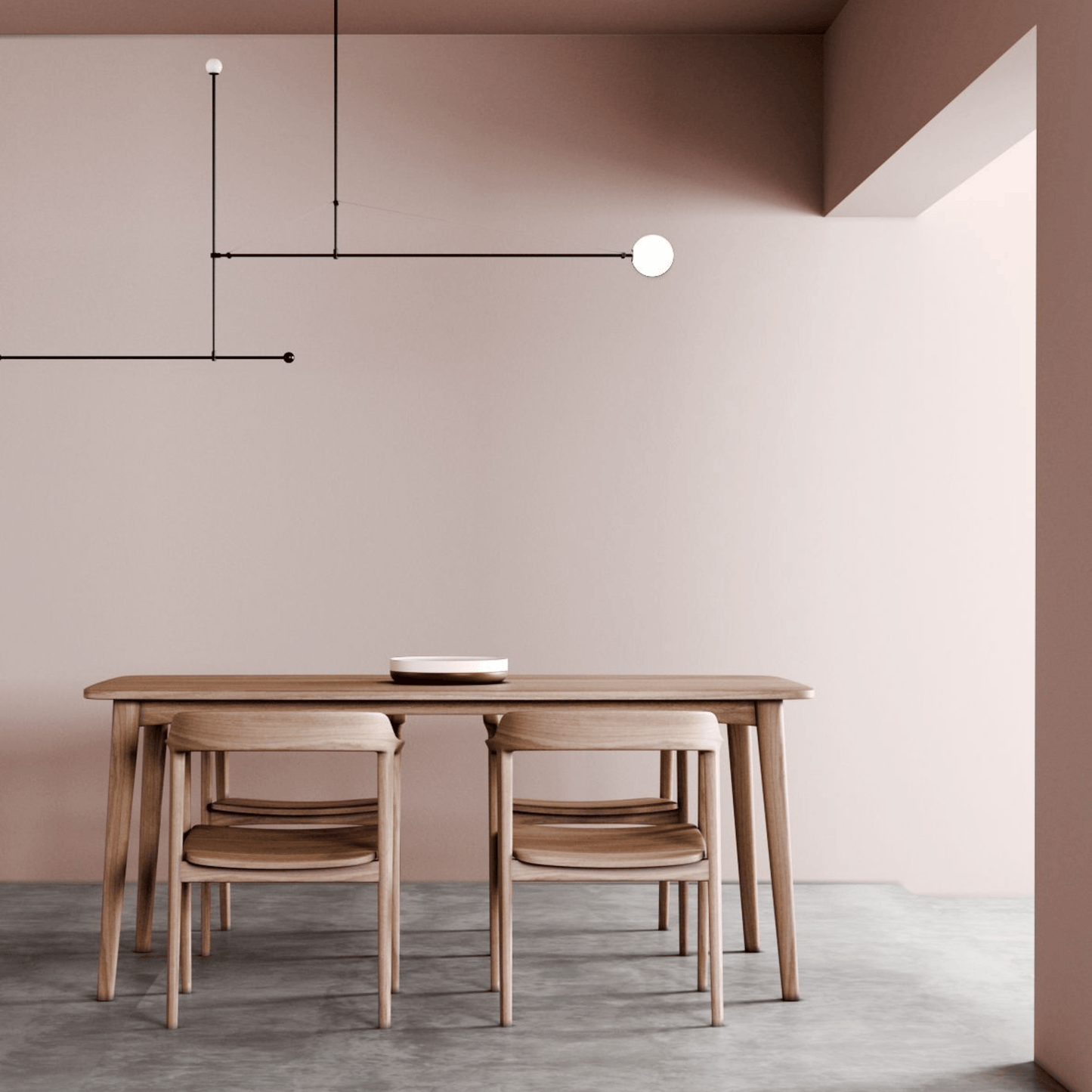 Dining room with table, chairs, and modern light fixture.