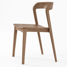 Wooden chair with curved back.