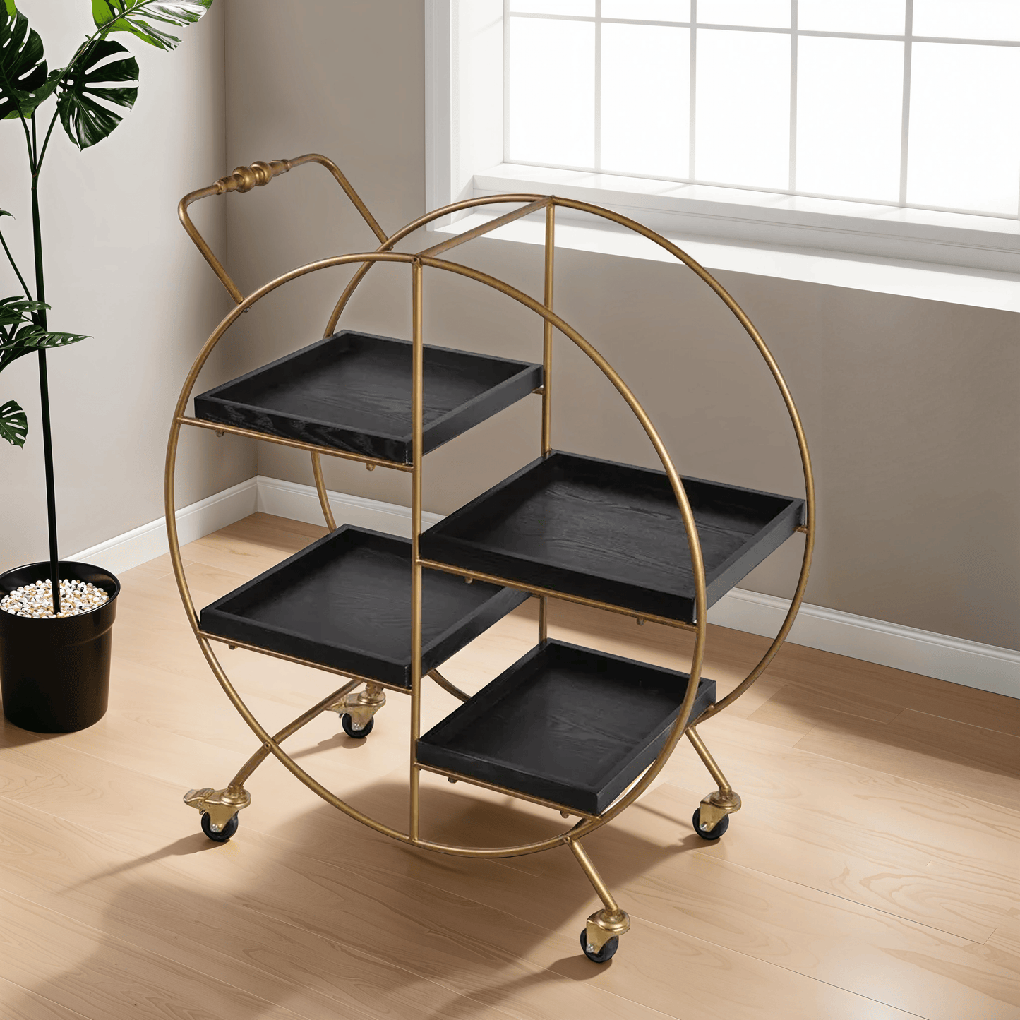 Gold bar cart with three black trays.